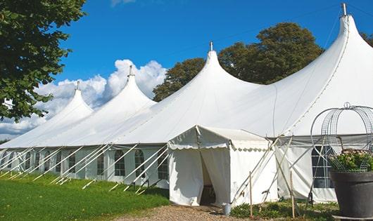 multiple portable restrooms for large-scale outdoor events, ensuring availability for all guests in Ripon